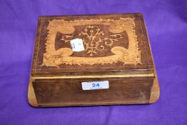 A 19th Century mahogany inlaid jewellery box with musical mechanism and compartmented interior, 8.