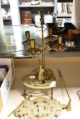 A selection of vintage brass, including candlestick, two snuffers and two trivets.