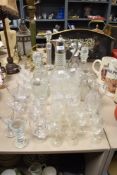 A mixed lot of glass wares, to include pressed glass decanter with silver tone lid and handle and