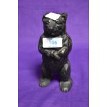 A vintage cast money bank, probably 19th Century, modelled as standing bear