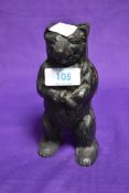 A vintage cast money bank, probably 19th Century, modelled as standing bear