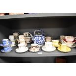 A selection of vintage tea and coffee wares in various designs including Oriental influenced blue