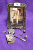 An Hall marked silver photograph frame and other white metal items including button hook with