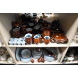 A large collection of vintage Denby table ware, in brown and blue colourway, inclduing tea and