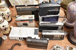 An assortment of retro radios, including Grundig, Morphy Richards and Cima.