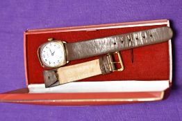 A vintage gold plated wristwatch by Tavannes having white enamel face having arabic dial with