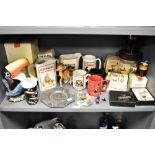 A collection of Guinness memorabilia including George V LNER buffet piece and pin badges