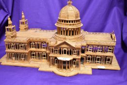 An intricate matchstick scupture of St Paul's Cathedral, measuring 20cm tall, 40cm wide, and 20cm