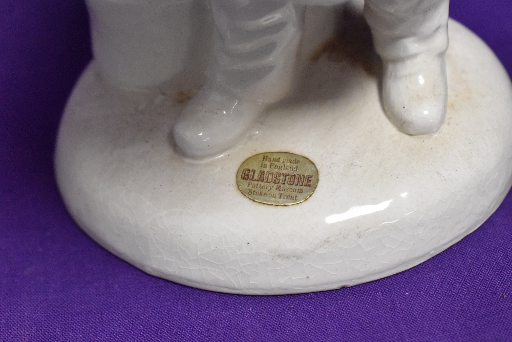 A Royal Worcester (marks rubbed) bucking horse and a Gladstone pottery baker - Image 3 of 3