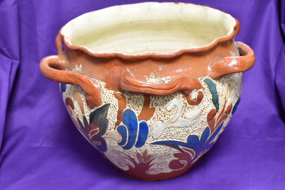 A CH Brannum, Barnstaple, Barum Art Pottery jardinere having foliate decoration, height approx. 24.