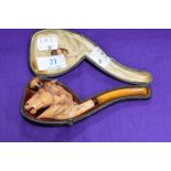 A 19th century meerschaum novelty smoking pipe in the form of a horse head and displayed in hard