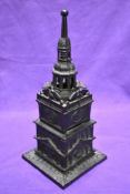 A novelty cast metal penny bank, modelled as 'Tower Bank'
