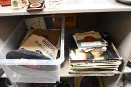 A box of Shellac records, predominantly classical an easy listening.
