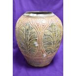 A decorative Grecian style stoneware vase having mottled tones, height approx. 35cm