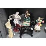 A collection of decorative figures including Coopercraft and Canadian Balloon lady