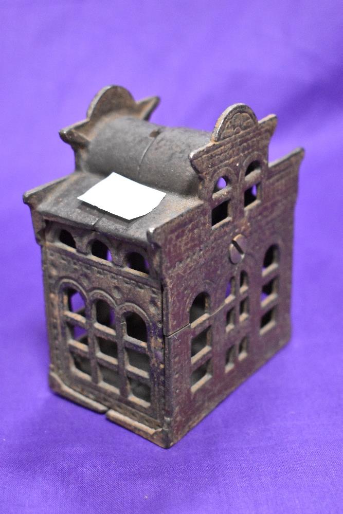 A novelty cast metal penny bank, modelled as city bank - Image 2 of 2