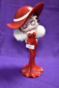 A contemporary King Features Syndicate sculpture modelled as Betty Boop, measuring 30cm tall
