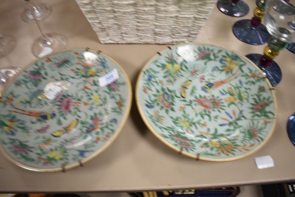 Two Chinese/in the Famile rose palettee, Cantonese plates, having blue ground with colourful
