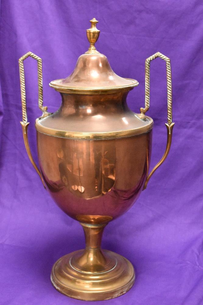 An antique copper and brass samovar, the body of classical vase form, and raised on a stepped - Image 2 of 2