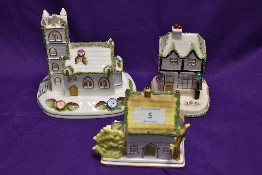 Three Coalport bone china ornaments, to comprise 'Village Church', 'The Old Curiosity Shop', & '