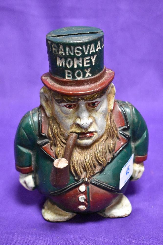 A novelty cast metal money box, Boer War interest, featuring caricatured president 'Transvaal