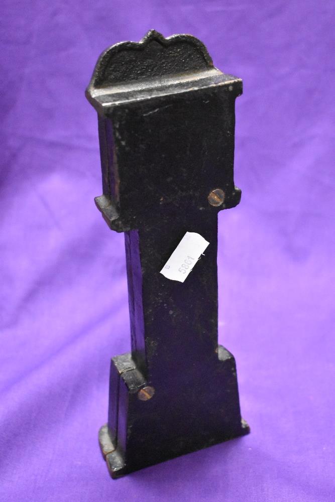 A cast metal penny bank, modelled as long case clock - Image 2 of 2