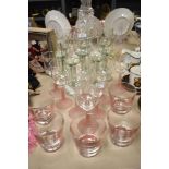 Eight rustic glass goblets, eight wine glasses with pink frosted glass stems and four matching