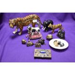 A selection of collectable trinkets etc including encrusted tiger, brass nut shell, heredities style