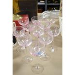 Eleven Caithness crystal glasses, having pink swirled design.