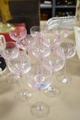 Eleven Caithness crystal glasses, having pink swirled design.