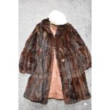 A vintage fur coat and hat