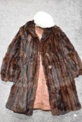 A vintage fur coat and hat