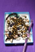 A box of mixed contemporary bead jewellery and a wristwatch