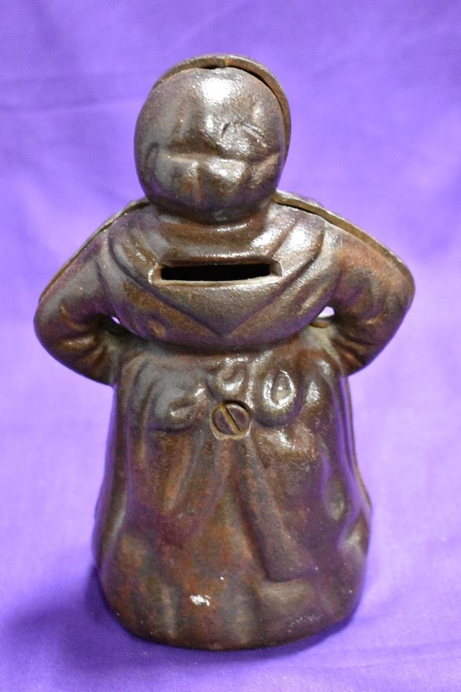 An early 20th century cast iron Aunt Jemima Mammy money bank, 18cm tall - Image 2 of 2