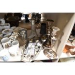 A Variued lot containing; two early 20th century Silver plated candlesticks, a hallmarked silver