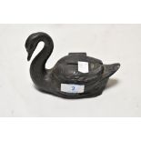 A 19th Century spelter money bank, in the form of a swan, the body with hinged lid, and measuring