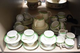 A collection of Swinnertons 'Nester Vellum' Staffodrshire pottery, having plain white ground with