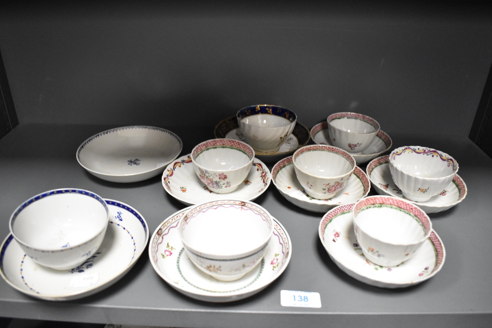 A selection of 18th Century Newhall porcelain tea bowls and saucers etc