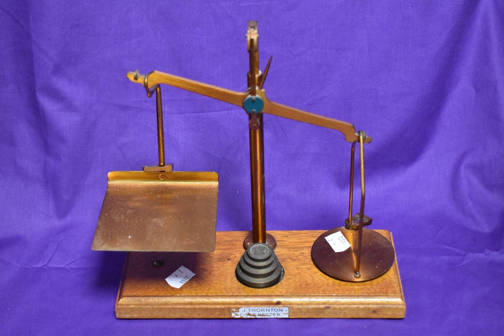 A set of J.Thornton of Colchester balance scales and weights, measuring 25cm tall