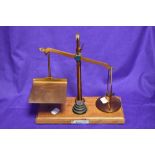 A set of J.Thornton of Colchester balance scales and weights, measuring 25cm tall