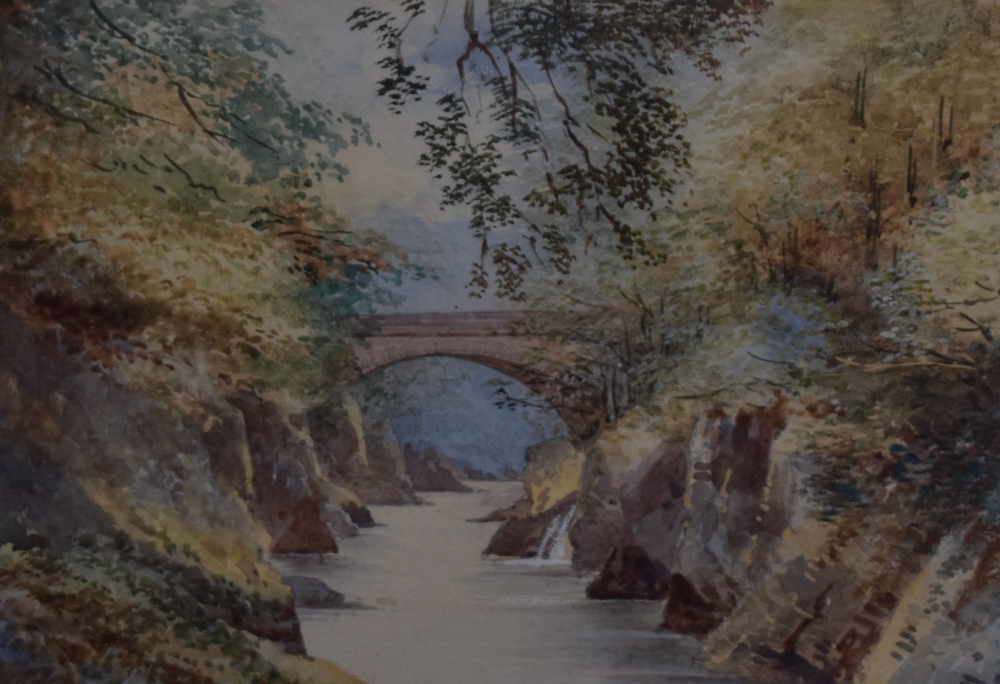 A late 19th/early 20th century British School watercolour, autumnal gorge with bridge, unsigned,