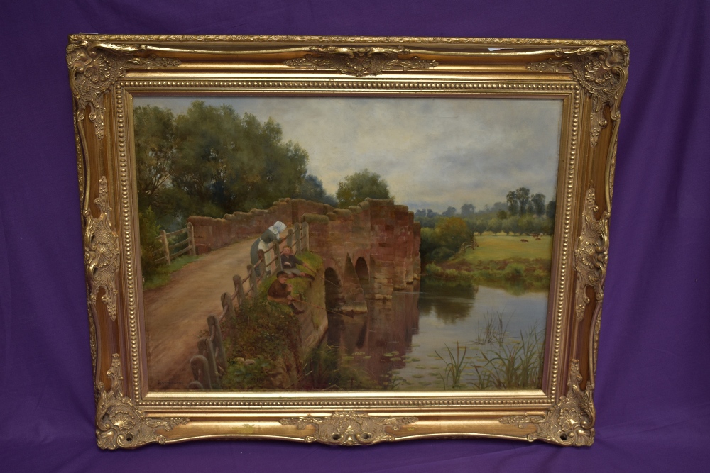 Sidney Currie (British act.1892-1930) oil on canvas, river scene with sandstone bridge and boys - Image 2 of 4