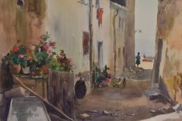 Ezequiel Torroella (1921-1998, Spanish), watercolour, 'Alleyway In A Fishing Village', signed to the