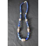 A lapis lazuli and silver bead necklace, approx 22'