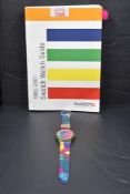 A Swatch 1983-2001 watch guide, sold together with an unboxed Swatch watch 'Ibiskus' wristwatch