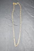 A 9ct gold figaro chain, approx 22' & 7g