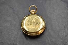 A small early 20th Century 18ct gold top wound hunter pocket watch having Roman numeral dial with