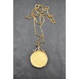 A 10 Guilders (Gulden) Netherlands gold coin in a removable gold mount on a 9ct gold chain, approx