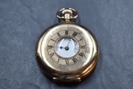 A 9ct rose gold half hunter top wound pocket watch by Waltham no: 26853443, having Roman numeral