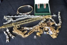 A small selection of gold plated jewellery including hinged bangle, necklaces, Grosse earrings,